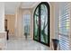 Grand foyer with custom front door and bright interior at 2355 Villandry Ct, Henderson, NV 89074