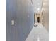 Hallway features marble flooring, textured wall and skylight at 2355 Villandry Ct, Henderson, NV 89074