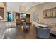 Spacious living room featuring a fireplace, built-in shelving, and elegant decor at 2355 Villandry Ct, Henderson, NV 89074