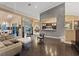 Bright living room that opens up to an outdoor dining and entertainment area at 2355 Villandry Ct, Henderson, NV 89074