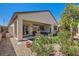 Inviting backyard with a hot tub, patio, and lush greenery for outdoor enjoyment at 2534 Starlight Valley St, Henderson, NV 89044