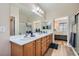 Beautiful bathroom featuring double sinks and plenty of counter space, with easy access to the Primary bedroom at 2534 Starlight Valley St, Henderson, NV 89044