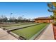 View of multiple bocce ball courts with well maintained surrounding landscape at 2534 Starlight Valley St, Henderson, NV 89044