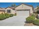 Inviting home featuring a two-car garage and low-maintenance landscaping at 2534 Starlight Valley St, Henderson, NV 89044