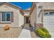 Close-up of home featuring neat front garden and a two car garage at 2534 Starlight Valley St, Henderson, NV 89044