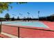 Outdoor tennis courts featuring vibrant colors and well-maintained fencing at 2534 Starlight Valley St, Henderson, NV 89044