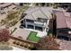 Aerial view of a home with a putting green, an outdoor kitchen, and covered patio at 257 Elder View Dr, Las Vegas, NV 89138