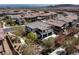 An aerial perspective of a well-kept, suburban home displaying lush landscaping and impeccable grounds at 257 Elder View Dr, Las Vegas, NV 89138