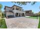 Expansive backyard with a patio, hot tub, outdoor seating, and a putting green at 257 Elder View Dr, Las Vegas, NV 89138