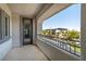 Balcony with wrought iron railing and views of the neighborhood at 257 Elder View Dr, Las Vegas, NV 89138