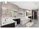 Luxurious bathroom showcasing a soaking tub, dual vanities, and elegant finishes at 257 Elder View Dr, Las Vegas, NV 89138
