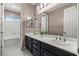 Bathroom featuring double sinks, modern finishes, and great lighting at 257 Elder View Dr, Las Vegas, NV 89138