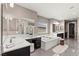 Elegant bathroom featuring double sinks, a soaking tub, and modern fixtures at 257 Elder View Dr, Las Vegas, NV 89138