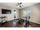 Versatile bonus room with a ceiling fan, exercise equipment, and natural light from the window at 257 Elder View Dr, Las Vegas, NV 89138