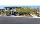 Charming two-story home boasts a well-manicured lawn and a private two-car garage at 257 Elder View Dr, Las Vegas, NV 89138