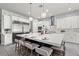 Modern kitchen with stainless steel appliances, an island with seating, and stylish countertops at 257 Elder View Dr, Las Vegas, NV 89138