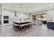 Spacious kitchen featuring an island with bar stools and stainless steel appliances at 257 Elder View Dr, Las Vegas, NV 89138