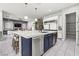 Bright kitchen with a large center island, stainless steel appliances, and ample cabinet space at 257 Elder View Dr, Las Vegas, NV 89138