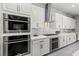 Modern kitchen with stainless steel appliances, sleek cabinetry, and a stylish backsplash at 257 Elder View Dr, Las Vegas, NV 89138