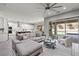Open-concept living room and kitchen with modern finishes and ample natural light at 257 Elder View Dr, Las Vegas, NV 89138