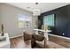 Home office with stylish decor, modern desk, and plenty of natural light at 257 Elder View Dr, Las Vegas, NV 89138