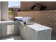 Built-in outdoor grill station with granite countertops and stainless steel drawers at 257 Elder View Dr, Las Vegas, NV 89138