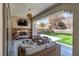 Covered patio overlooking outdoor putting green at 257 Elder View Dr, Las Vegas, NV 89138