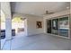 Covered patio with ceiling fan and access to the backyard at 257 Elder View Dr, Las Vegas, NV 89138