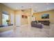 Spacious living room featuring marble floors, recessed lighting, and modern decor at 2608 Port Of Call Dr, Las Vegas, NV 89128
