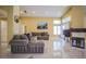 Open-concept living room featuring sleek marble floors and plenty of natural light at 2608 Port Of Call Dr, Las Vegas, NV 89128