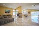Open floor plan featuring marble flooring, recessed lighting, and a view of the dining room at 2608 Port Of Call Dr, Las Vegas, NV 89128