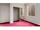 Bedroom featuring sliding mirror closet doors and a window at 2622 Rimpacific Cir, Las Vegas, NV 89146