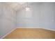 Spacious living room with vaulted ceilings, hardwood floors, and a modern light fixture at 2622 Rimpacific Cir, Las Vegas, NV 89146