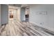 Bright bedroom showcasing hardwood floors, leading to an ensuite bathroom and open entryway at 2700 Las Vegas Blvd # 3501, Las Vegas, NV 89109