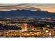 Extensive city view showcasing illuminated buildings and landscape with mountain backdrop at 2700 Las Vegas Blvd # 3501, Las Vegas, NV 89109