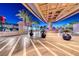 Inviting entrance with palm trees and decorative planters at twilight at 2700 Las Vegas Blvd # 3501, Las Vegas, NV 89109