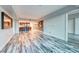 Spacious living area boasts wood floors, stylish decor, and convenient access to the kitchen at 2700 Las Vegas Blvd # 3501, Las Vegas, NV 89109