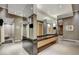 Modern locker room featuring sleek mirrors, a vanity area, and convenient showers at 2700 Las Vegas Blvd # 3501, Las Vegas, NV 89109
