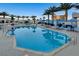 Expansive pool deck with sparkling pool, palm trees, and comfortable lounge seating, perfect for relaxation and entertainment at 2700 Las Vegas Blvd # 3501, Las Vegas, NV 89109