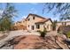 Backyard featuring gravel, desert landscaping and partial fence at 2739 Cramond St, Henderson, NV 89044