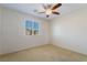 Bedroom featuring neutral carpet, a ceiling fan, and a window at 2739 Cramond St, Henderson, NV 89044