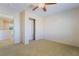 Bedroom featuring neutral carpet, ceiling fan, and a closet at 2739 Cramond St, Henderson, NV 89044