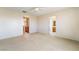 Carpeted bedroom with closet and bathroom entrances at 2739 Cramond St, Henderson, NV 89044