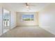 Carpeted bedroom with window offering a scenic view at 2739 Cramond St, Henderson, NV 89044