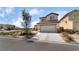 Charming two-story home with desert landscaping and a two-car garage at 2739 Cramond St, Henderson, NV 89044