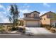 Charming two-story home with desert landscaping and a two-car garage at 2739 Cramond St, Henderson, NV 89044