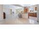 Wide open floor plan with eat-in kitchen, dining area, and spacious living room with fireplace at 2739 Cramond St, Henderson, NV 89044