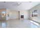 Bright living room with tile floors, fireplace, and lots of natural light at 2739 Cramond St, Henderson, NV 89044
