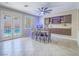 Dining room with backyard access, a ceiling fan, and custom built-in cabinetry at 2743 Peekskill Ave, Henderson, NV 89052