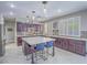 Spacious kitchen featuring a large island, stainless steel appliances, and modern cabinets at 2743 Peekskill Ave, Henderson, NV 89052